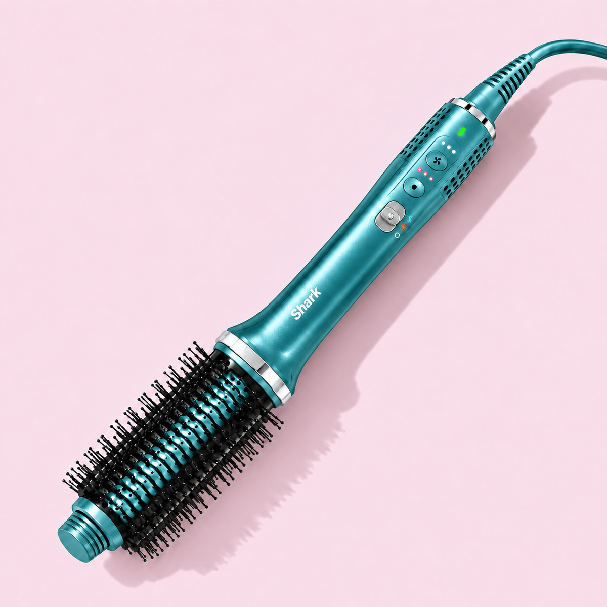 Shark Glossi Blue Juniper brush on the matching pink studio background