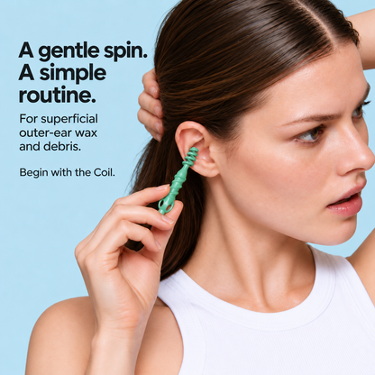 Woman demonstrating the green Coil at the accessible outer ear.