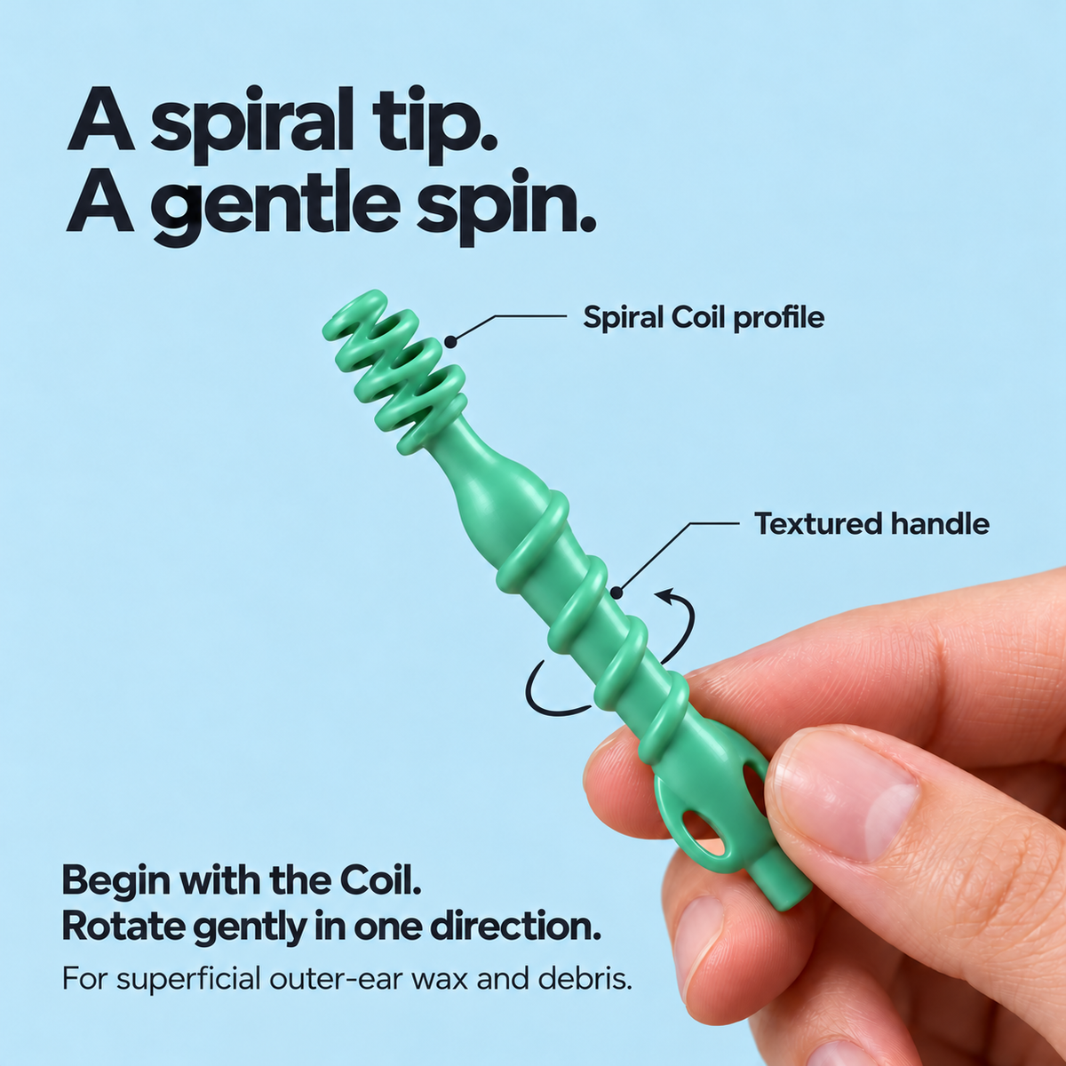 Close-up of the Coil's spiral tip and textured handle with a gentle rotation guide.