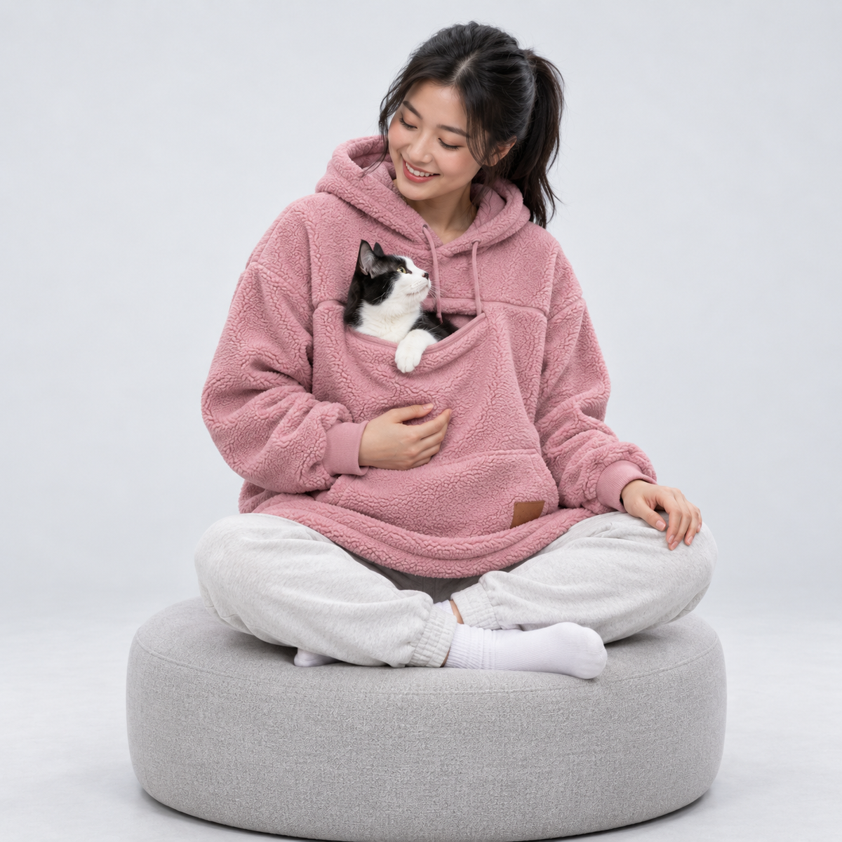 Pale Pink color option of the sherpa pet carrier hoodie.